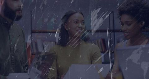 Diverse Business Team Collaborating with Modern Technology in Office