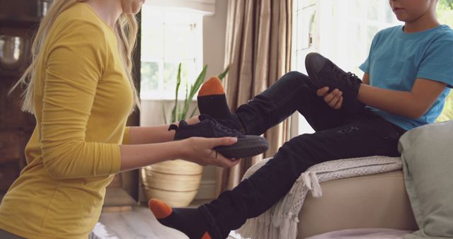 Mother Assisting Child with Shoes at Home - Download Free Stock Images Pikwizard.com