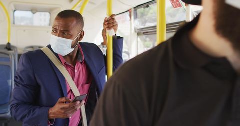 Businessman in City Bus Wearing Face Mask Using Smartphone - Download Free Stock Images Pikwizard.com