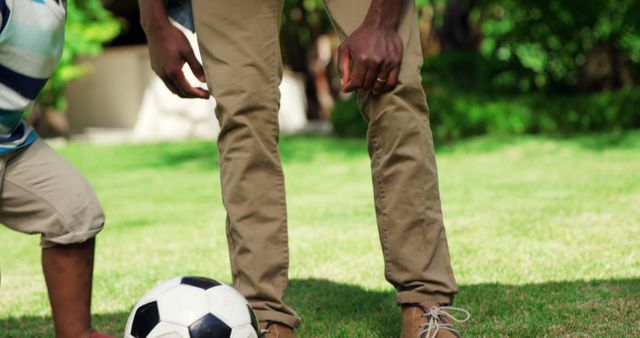 Father and Son Playing Soccer on Grass Field - Download Free Stock Images Pikwizard.com