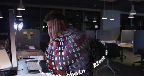tired programmer around blockchain binary data late night office - Download Free Stock Images Pikwizard.com