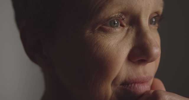 Close-Up of Thoughtful Elderly Woman with Pensive Expression - Download Free Stock Images Pikwizard.com