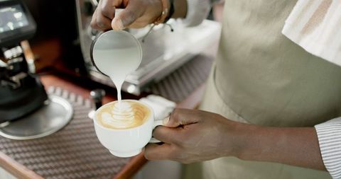 Barista Crafting Latte Art in Inviting Café - Download Free Stock Images Pikwizard.com