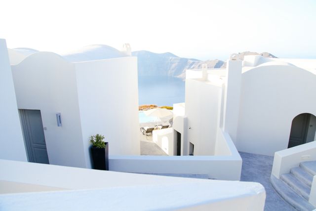 Whitewashed Mediterranean Architecture Overlooking the Sea - Download Free Stock Photos Pikwizard.com