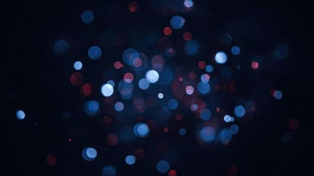 Abstract Bokeh Lights Floating in Dark Ambient Space