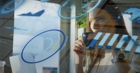 Businesswoman Analyzing Financial Data Through Digital Interface