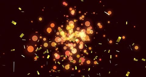 Radiant bokeh confetti burst on deep maroon backdrop for festive abstract visuals