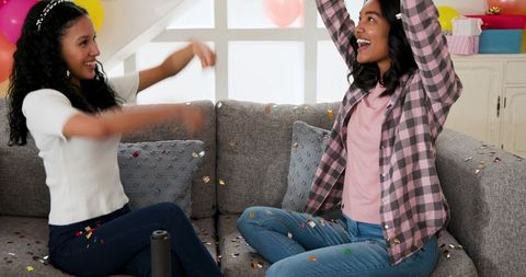 Joyful Celebration with Confetti and Balloons