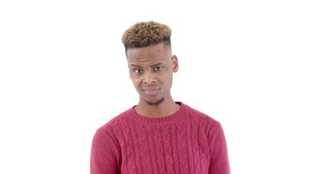 Confused Young Man in Red Sweater Portrait White Background