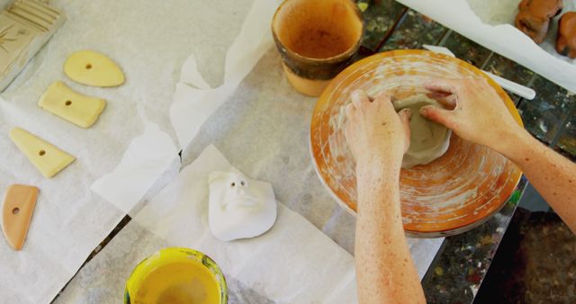 Hands Sculpting Clay on Pottery Wheel in Creative Ceramic Art Studio - Download Free Stock Images Pikwizard.com