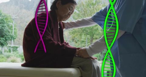 Senior woman receiving compassionate nursing care with dna helix overlay healthcare concept