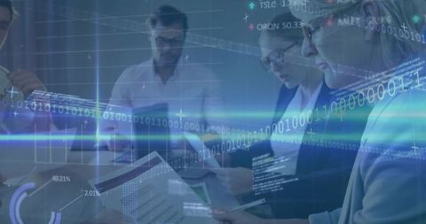 Team analyzing emerging business analytics with digital overlays