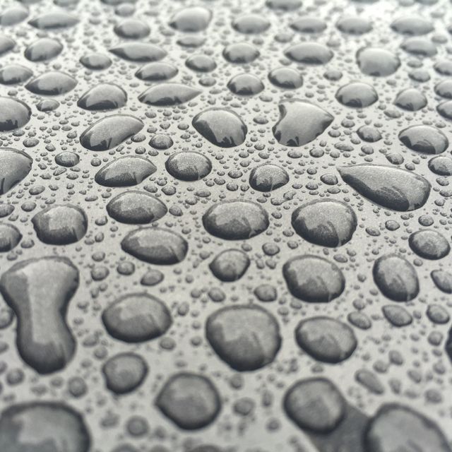Close-Up of Water Droplets on Smooth Surface - Download Free Stock Photos Pikwizard.com