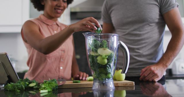 Couple Preparing Healthy Green Smoothie with Fresh Vegetables - Download Free Stock Images Pikwizard.com