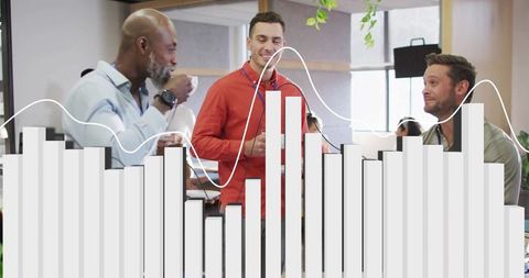 Colleagues Discuss Financial Data in Modern Office