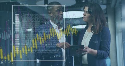 Business professionals reviewing tablet with financial candlestick charts and data overlays