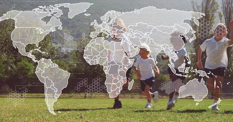 Children running on sunny park field with world map overlay representing global play