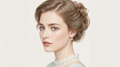 Elegant beautiful lady portrait with lace blouse and drop earrings