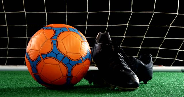 Close-up of Soccer Ball and Cleats on Field - Download Free Stock Images Pikwizard.com