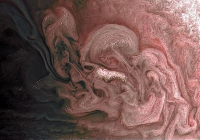 This image captures a close-up view of a storm with bright cloud tops in the northern hemisphere of Jupiter.  NASA's Juno spacecraft took this color-enhanced image on Feb. 7 at 5:38 a.m. PST (8:38 a.m. EST) during its 11th close flyby of the gas giant planet. At the time, the spacecraft was 7,578 miles (12,195 kilometers) from the tops of Jupiter's clouds at 49.2 degrees north latitude.  Citizen scientist Matt Brealey processed the image using data from the JunoCam imager. Citizen scientist Gustavo B C then adjusted colors and embossed Matt Brealey's processing of this storm.  https://photojournal.jpl.nasa.gov/catalog/PIA21981