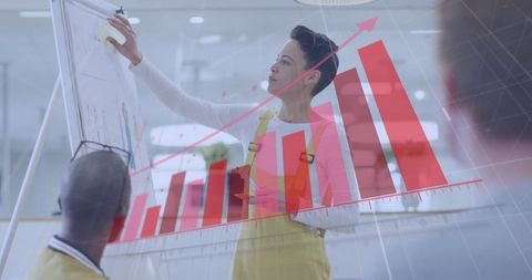 Woman Presenting Financial Growth and Business Strategy - Download Free Stock Images Pikwizard.com