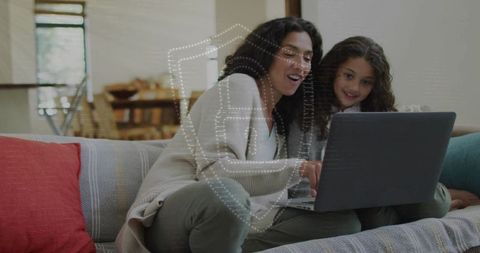 Mother and Daughter Protecting Online Privacy While Learning and Browsing on Laptop