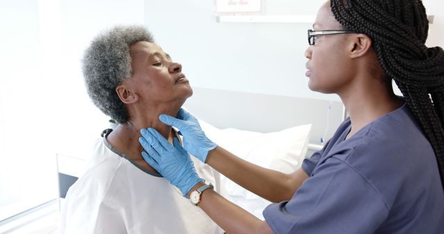 Healthcare worker in uniform examining senior patient in a hospital room. This can be used for depicting medical care, health checkups, elderly healthcare services, doctor-patient interactions, and promoting hospital or clinic services.