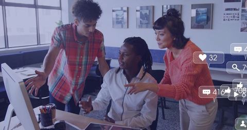 Diverse Team Collaborating on Project in a Modern Office