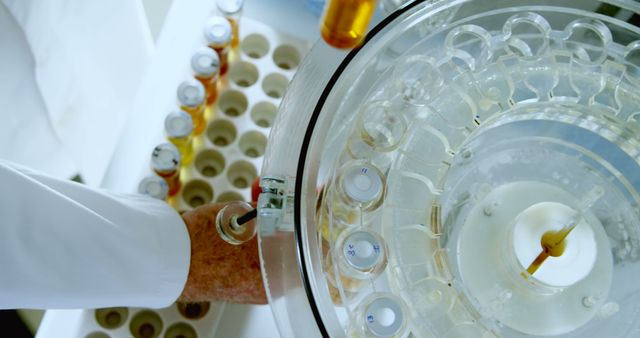 Scientist Using Centrifuge Machine in Laboratory for Medical Research - Download Free Stock Images Pikwizard.com