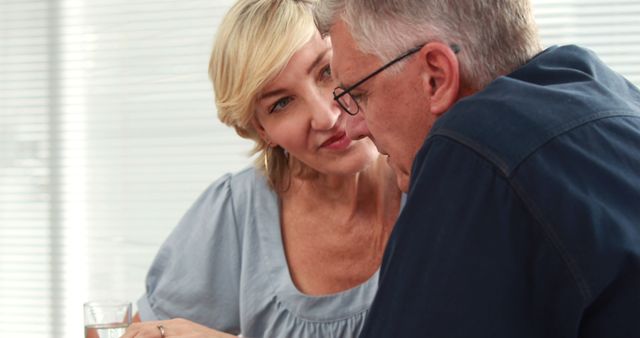 Loving Senior Couple Having Intimate Conversation at Home - Download Free Stock Images Pikwizard.com