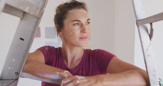 Woman Taking a Break while Painting New House Interior - Download Free Stock Images Pikwizard.com