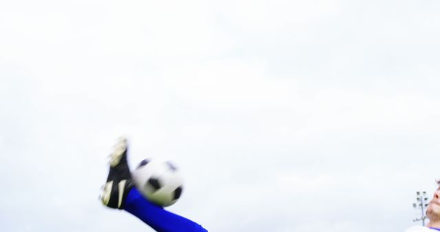 Blurred Close-up of Soccer Player Performing Overhead Kick - Download Free Stock Images Pikwizard.com