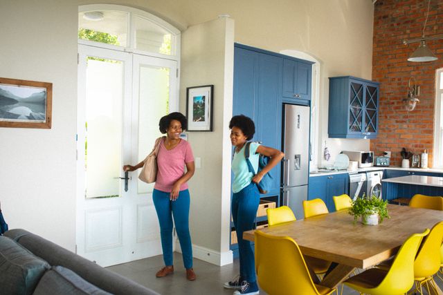 African American Mother and Teenage Daughter Talking at Home - Download Free Stock Images Pikwizard.com