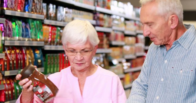 Senior couple shopping in grocery store in high quality 4k format