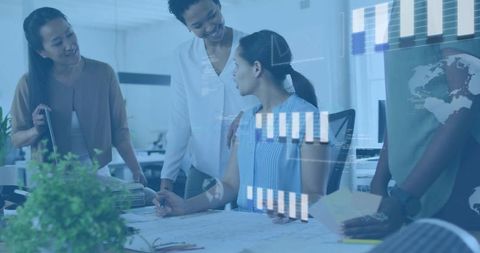 Collaborating on blueprints with data overlays, women professionals designing together