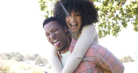Joyful African American Couple Embracing in Backyard Garden - Download Free Stock Images Pikwizard.com