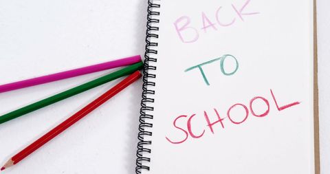 Colorful back to school concept with pencils and notebook