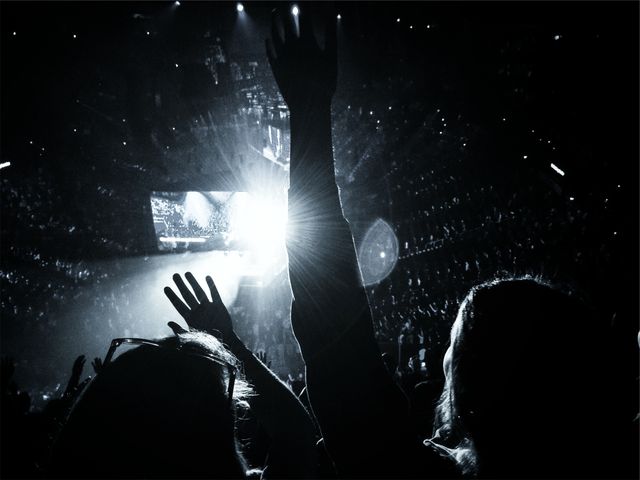 Silhouetted Crowd Enjoying Concert in Dark Auditorium - Download Free Stock Photos Pikwizard.com