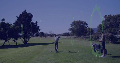 Golfer Practicing Swing on Sunny Golf Course Clear Day
