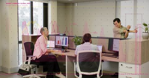 Team analyzing financial charts in open plan office with dashboard metrics and collaboration
