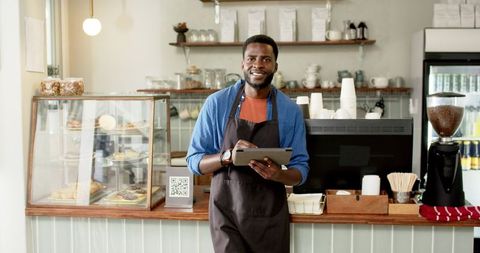 Barista with Tablet in Modern Coffee Shop Interior - Download Free Stock Images Pikwizard.com