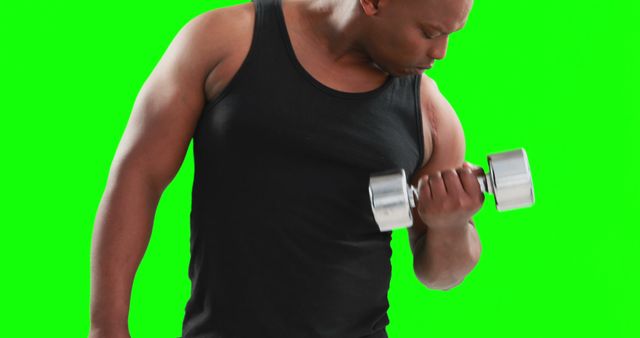 Muscular Black Man Lifting Dumbbell with Green Background - Download Free Stock Images Pikwizard.com