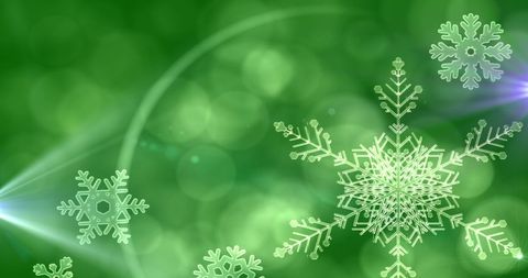 Abstract Green Background with Snowflakes and Light Bokeh