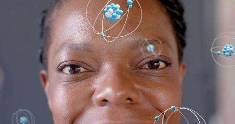 African American woman closeup showing natural skin texture with floating molecular orbits