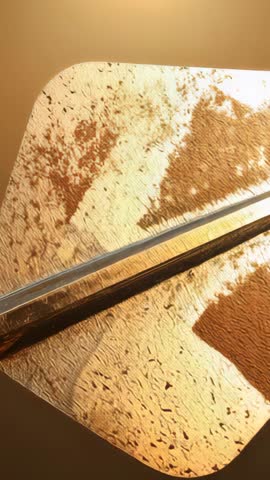 Industrial motor rotating metal plate and rod revealing textured patina in vertical loop