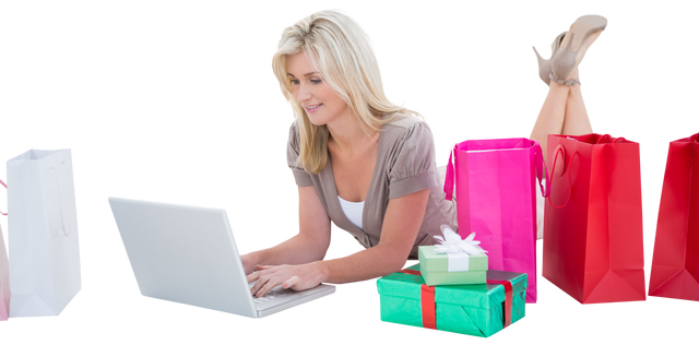 Happy Blonde Woman Shopping Online with Laptop and Gifts on Transparent Background - Download Free Stock Videos Pikwizard.com