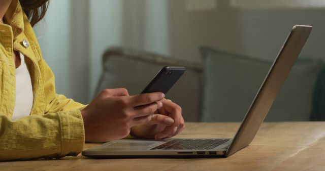 Woman Using Laptop and Smartphone at Home, Working or Studying Remotely - Download Free Stock Images Pikwizard.com