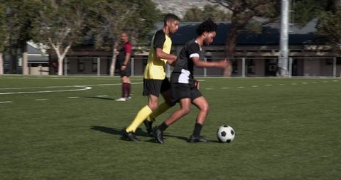 Soccer Match Players Competing with Intense Focus