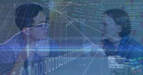 Young professionals collaborating on data-driven finance charts with digital overlays