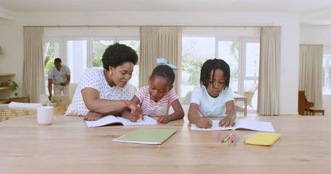 Mother Assisting Children with Homework in Bright Home Setting